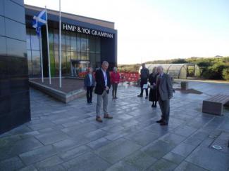 People standing out HMP&YOI Grampian prison